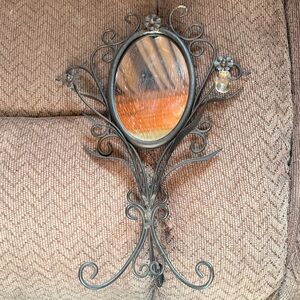 Elegant Black Wall Mirror with Floral Accents